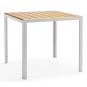 Mesa garibaldi, metal blanco, tablero polywood amarillo, 80 x 80 cms.